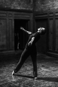 gillian in a tendu leaning back and looking up