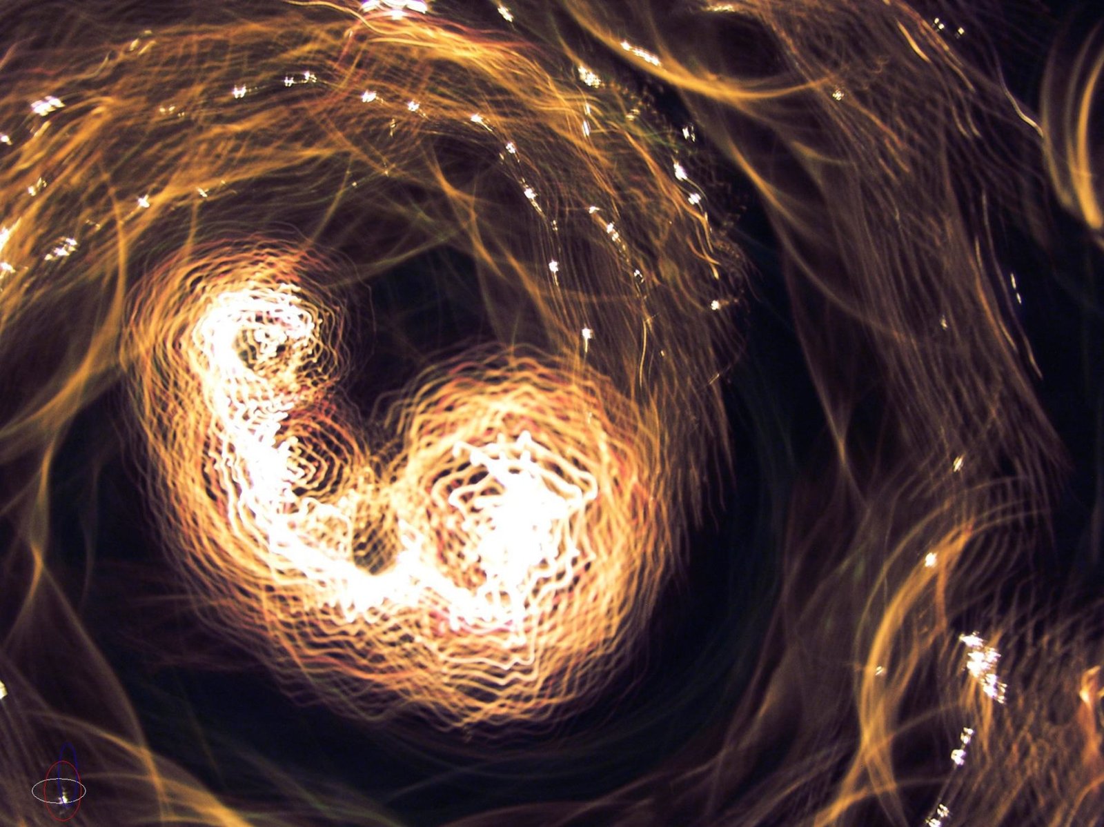 light painting in the shape of a heart in gold