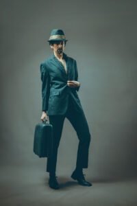 the man in the suit in a model pose